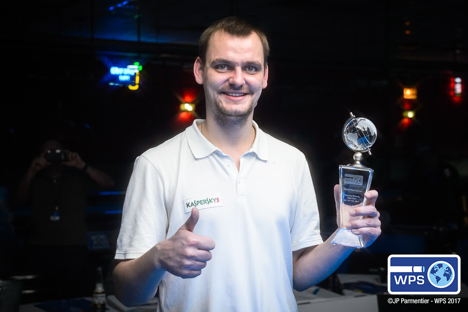 Russia's Ruslan Chinakov is all smiles after capturing the Molinari Players Championship at Steinway Billiards in New York City