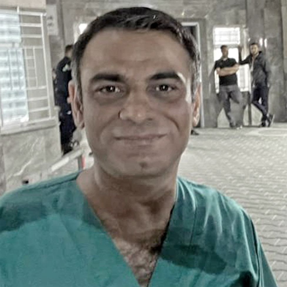 Dr Midhat Saidam wearing scrubs