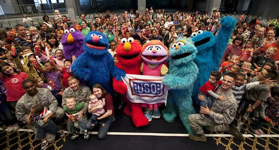 Sesame Street and the USO head overseas to perform for service members and their families
