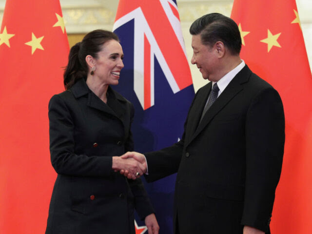 BEIJING, CHINA - APRIL 01: Chinese President Xi Jinping, right and New Zealand Prime Minister Jacinda Ardern, left shake hands before the meeting at the Great Hall of the People on April 1, 2019 in Beijing, China. (Kenzaburo Fukuhara - Pool/Getty Images)