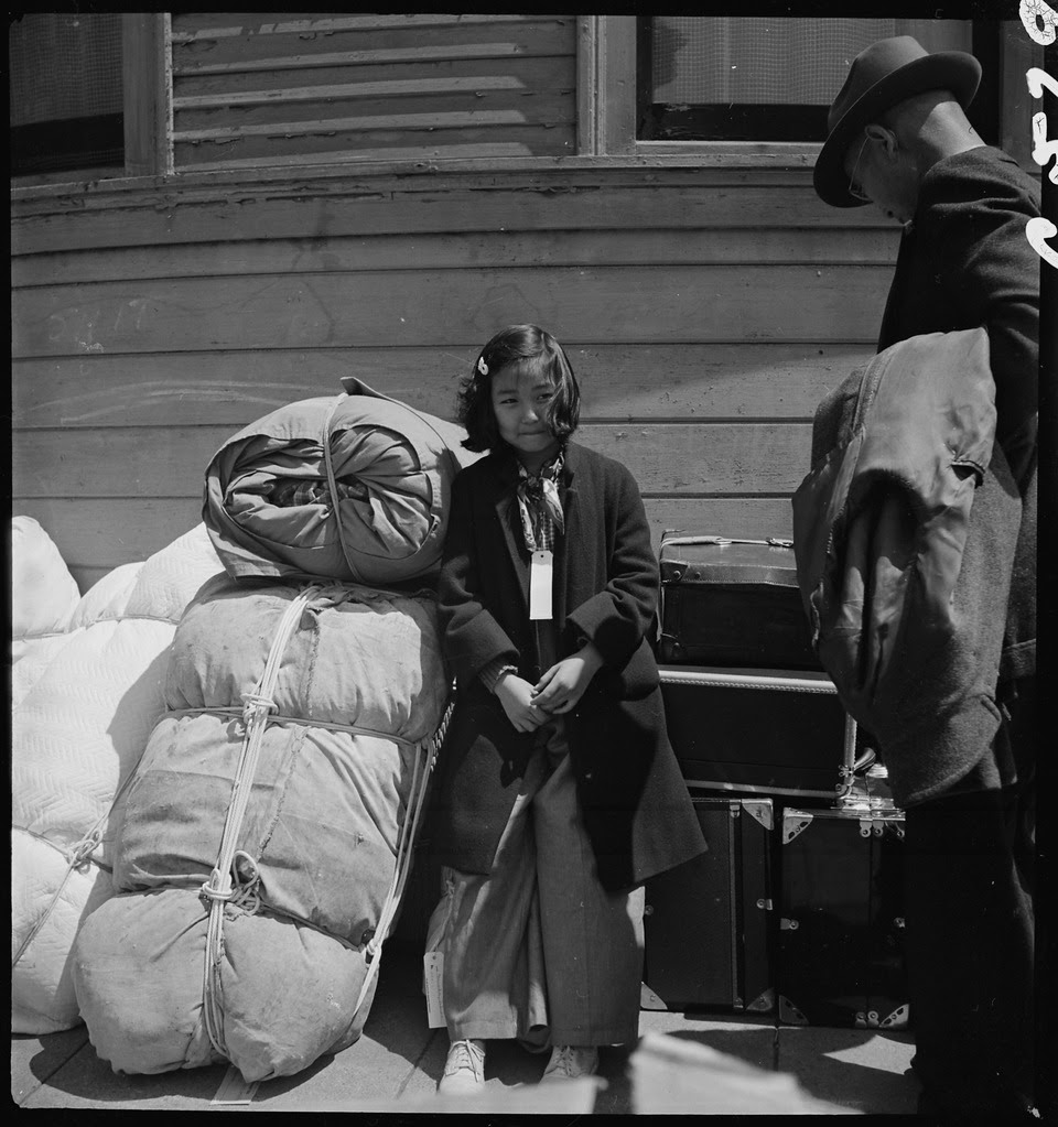 http://upload.wikimedia.org/wikipedia/commons/thumb/a/af/Oakland%2C_California._Young_evacuee_of_Japanese_ancestry_guarding_the_family_belongings_near_the_War_._._._-_NARA_-_537889.tif/lossy-page1-960px-Oakland%2C_California._Young_evacuee_of_Japanese_ancestry_guarding_the_family_belongings_near_the_War_._._._-_NARA_-_537889.tif.jpg