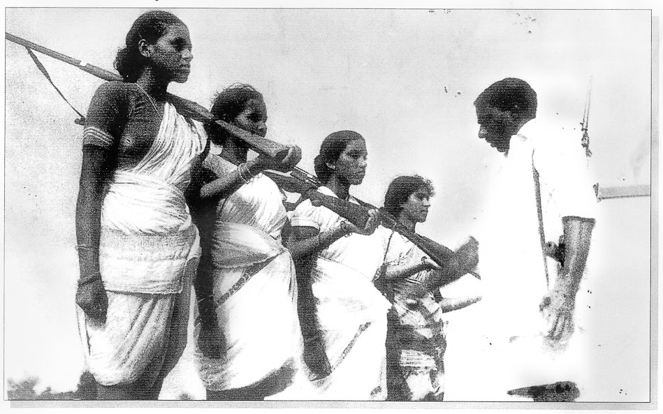 Caption: Mallu Swarajyam (left) and other members of an armed squad during the Telangana armed struggle (1946-1951). Credit: Sunil Janah / Prajasakti Publishing House.
