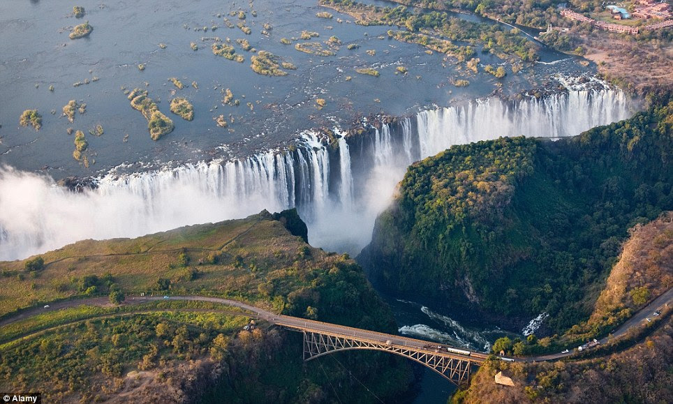 Victoria Falls, Zimbabwe/Zambia: Explorer David Livingstone named the waterfalls of the Zambezi River after Queen Victoria, but locals call them Mosi-oa-Tunya, meaning 'the smoke that thunders'. Located on the border between Zimbabwe and Zambia, the falls plummet 108m, creating a mist that is visible from 20km away