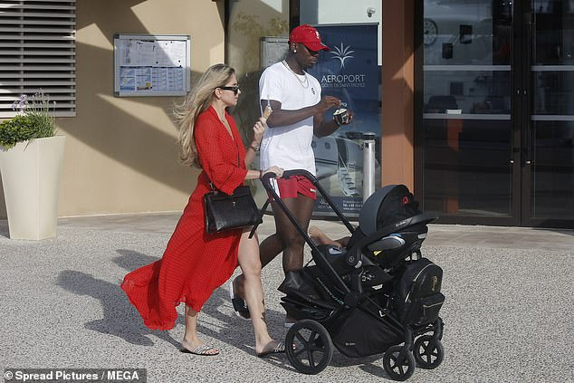 Man.U star Paul Pogba and girlfriend Maria Salaues take their son for a sunny stroll in Saint Tropez (Photos)