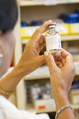 woman with vial