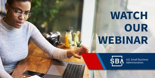 Woman in front of a computer with the text, "Watch our Webinar"