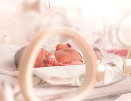 newborn baby in incubator