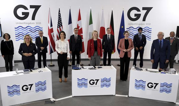 G-7 Foreign and Development Ministers pose for a group photo in Liverpool, England Sunday, Dec. 12, 2021. Foreign Secretary Liz Truss is hosting U.S. Secretary of State Antony Blinken and other Group of Seven counterparts for weekend talks in the northwest England port city of Liverpool as the wealthy nations club faces growing tensions with Russia, China and Iran. From left, Italy&#39;s Deputy Minister of Foreign Affairs Marina Sereni, German Federal Minister for Economic Cooperation and Development Svenja Schulze, Phillippines Secretary of Foreign Affairs Teodoro L Locsin Jr, Germany&#39;s Foreign Minister Annalena Baerbock, Italy&#39;s Foreign Minister Luigi Di Maio, Britain&#39;s Foreign Secretary Liz Truss, US Secretary of State Antony Blinken, Canada&#39;s Minister of Foreign Affairs Melanie Joly, Canada&#39;s Minister of International Development Harjit Sajjan, High Representative of the Union for Foreign Affairs Josep Borrell and Brunei Darussalam&#39;s Minister of Foreign Affairs Dato Erywan Pehin Yusof. (Olivier Douliery/Pool via AP)