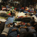 syrian_refugees_having_rest_at_the_floor_of_keleti_railway_station-_refugee_crisis-_budapest_hungary_central_europe_5_septemb