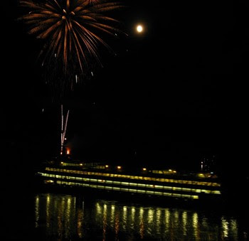 Photo of fireworks above a ferry