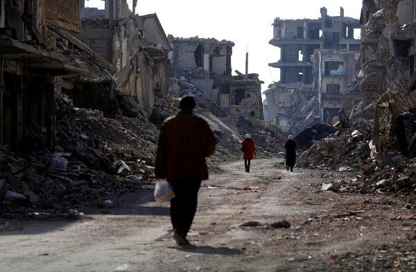 Rubble on the outskirts of Damascus, the capital of Syria. Widespread damage and displacement from the war have contributed to the country’s economic woes.