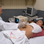 1280px-Medical_ultrasound_examination,_2