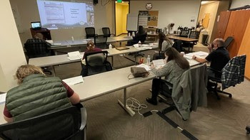 Photo of people in a classroom