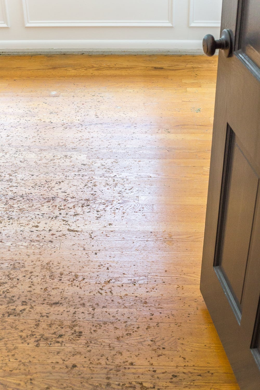 A step-by-step tutorial for refinishing an existing hardwood floor, including a complete list of materials and tips for a seamless process.