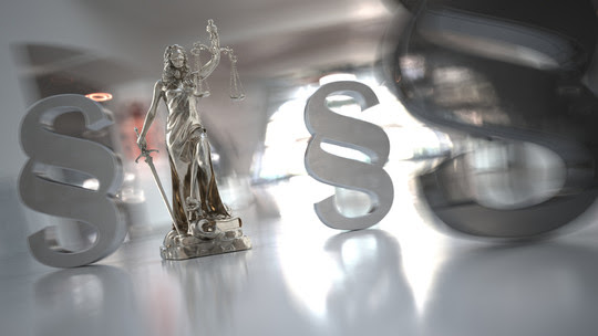 Image of Lady Justice with Paragraph Symbols