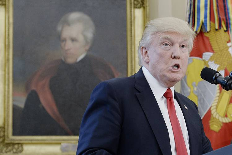 President Trump discusses an executive order on trade, March 31, in front of a portrait of President Andrew Jackson, who served 1829-37.