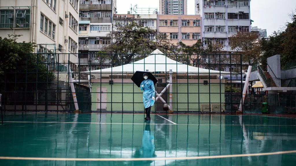 healthcare worker wearing personal protective equipment at a Covid-19 testing facility in Hong Kong