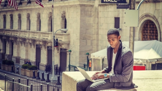 20150701170930-surveyed-choose-entrepreneurship-despite-sacrifices-black-male-computer-laptop-working-outside-wall-street.jpeg