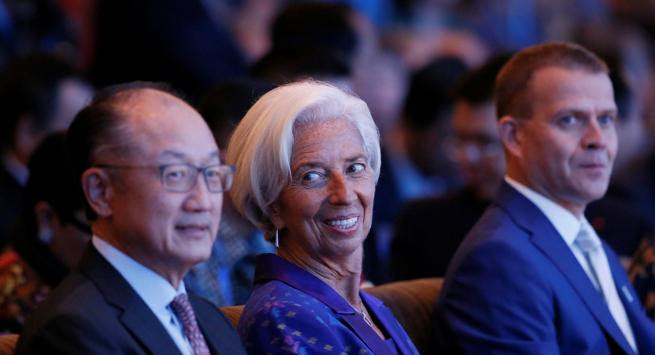 El presidente del Banco Mundial,  Jim Yong Kim; Christine Lagarde, al frente del FMI; y el ministro finlandés de finanzas, Petteri Orpo, en un evento esta semana