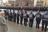 Members of the Flatbush Shomrim Safety Patrol pay their respects.
