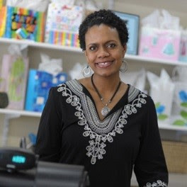 sales person at a cash register
