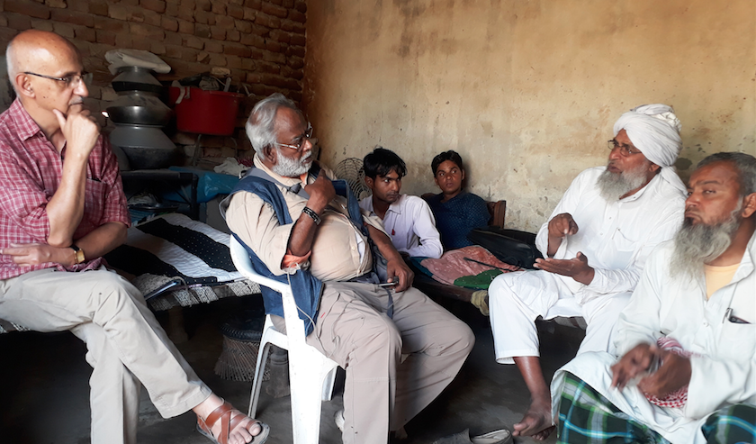 The Karwan e Mohabbat team speaks with a family in Mewat, Haryana.