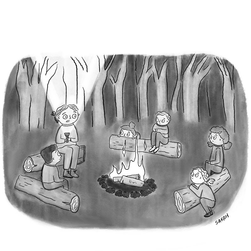 A group of people are telling scary stories around a campfire.