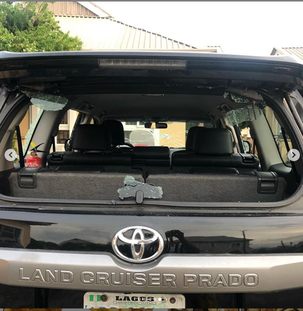 Xenophobia: Lady shares photos of injuries she sustained and damages done to her car after being attacked in Lagos protest