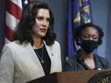 In this June 17, 2020, pool file photo provided by the Michigan Office of the Governor, Michigan Gov. Gretchen Whitmer speaks in Lansing, Mich. A federal appeals court late Wednesday, June 24, 2020, halted a lower judge&#39;s ruling and kept closed gyms and fitness centers that Whitmer ordered shut months ago to curb the coronavirus. (Michigan Office of the Governor via AP, Pool) **FILE**