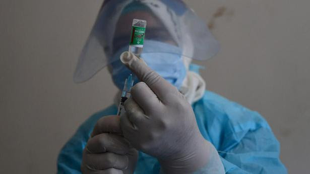 A nurse prepares a shot of a vaccine against COVID-19 at a primary health center in Srinagar on Saturday, May 8, 2021. File. 