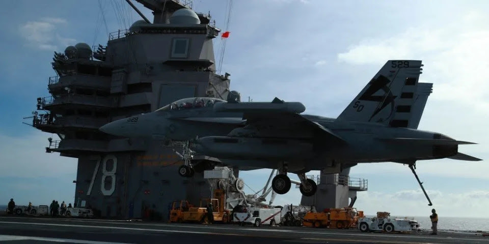 An EA-18G Growler, assigned to Air Test and Evaluation Squadron (VX) 23, prepares to land aboard USS Gerald R. Ford&#39;s (CVN 78) flight deck.