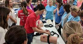 MRC volunteers demonstrating how to control bleeding during a recent Stop the Bleed training session
