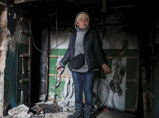 Local resident Olga is seen in her destroyed flat in Borodyanka, amid Russia's invasion of Ukraine, in Kyiv region, Ukraine, April 5, 2022.