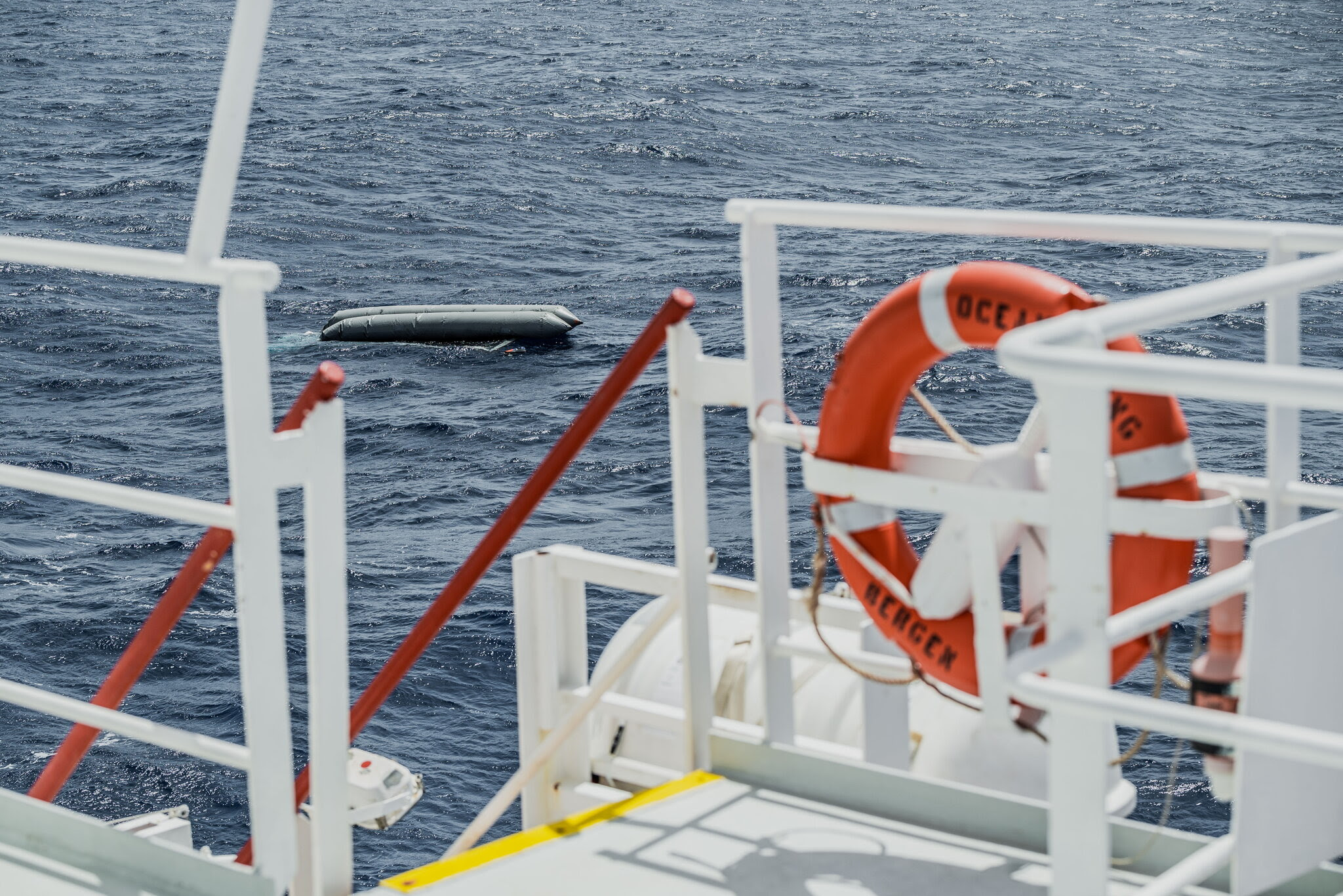 A rubber boat capsized off of the coast of Libya