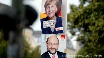 Campaign posters of Angela Merkel and Martin Schulz