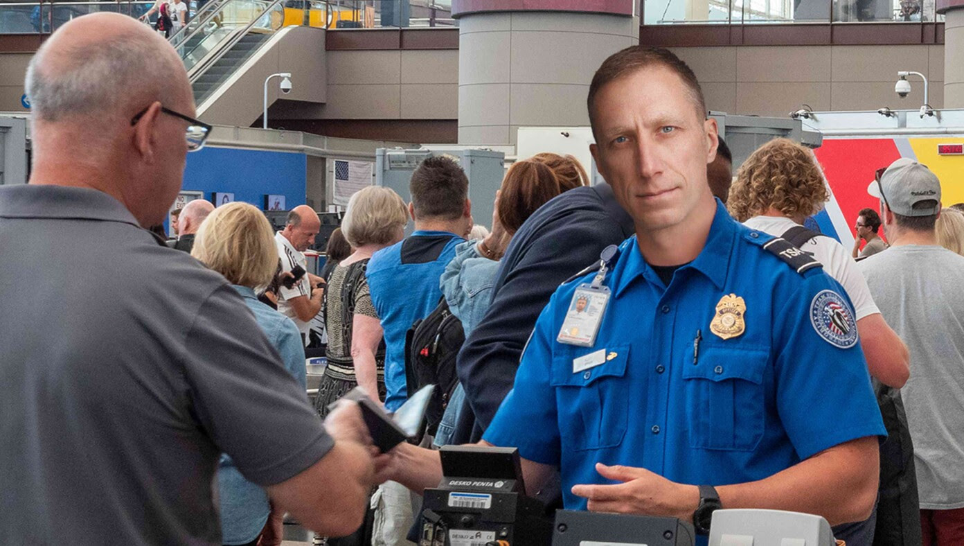 TSA Agent Flips Coin Every Morning To See If He's Going To Be Pleasant Or Bellow At You Like Drill Sergeant
