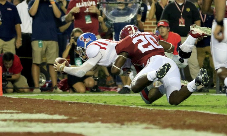 Chad Kelly (#10) dives into the end zone for an Ole Miss touchdown in 2015 versus Alabama