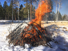 debris burning with snow cover