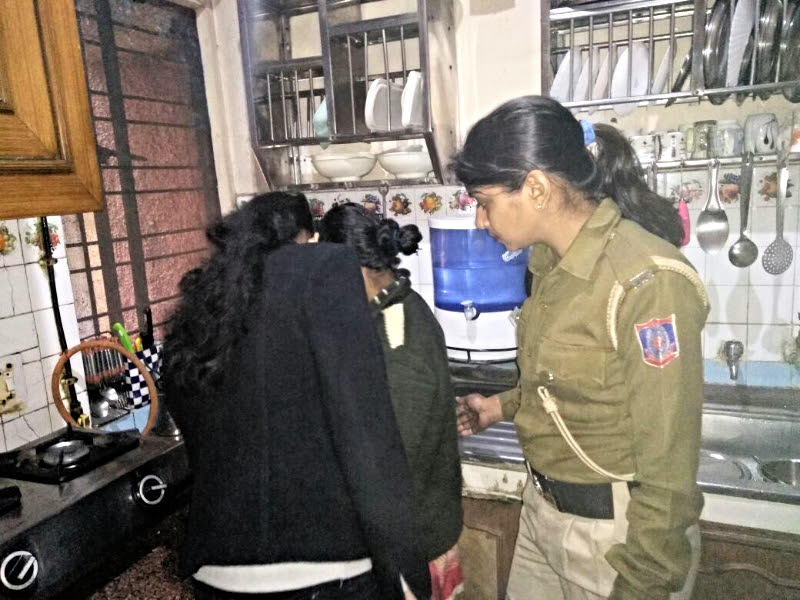 Victim with police at the time of rescue Victim with police at the time of rescue