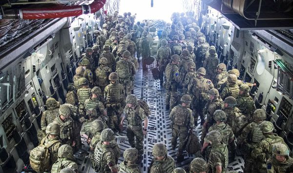 In this photo provided by the Ministry of Defence on Sunday, Aug. 15, 2021, members of the 16 Air Assault Brigade arrive in Kabul as part of a 600-strong UK-force sent to assist with Operation PITTING to rescue British nationals in Afghanistan amidst the worsening security situation there. (Leading Hand Ben Shread/Ministry of Defence via AP)