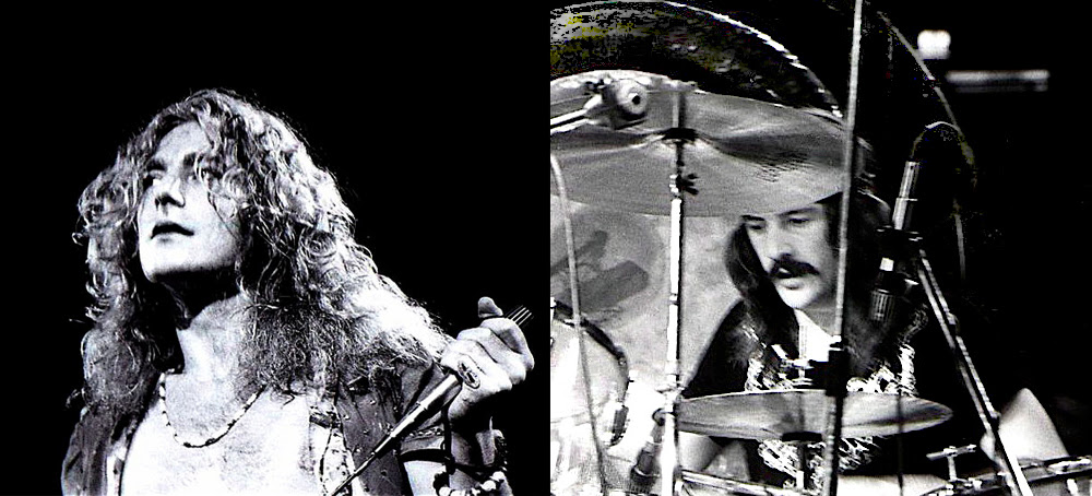 Lead singer Robert Plant holds a microphone stand while John Bonham plays the drums during a 1970s Led Zeppelin rock concert