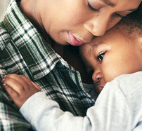 Mother comforting child