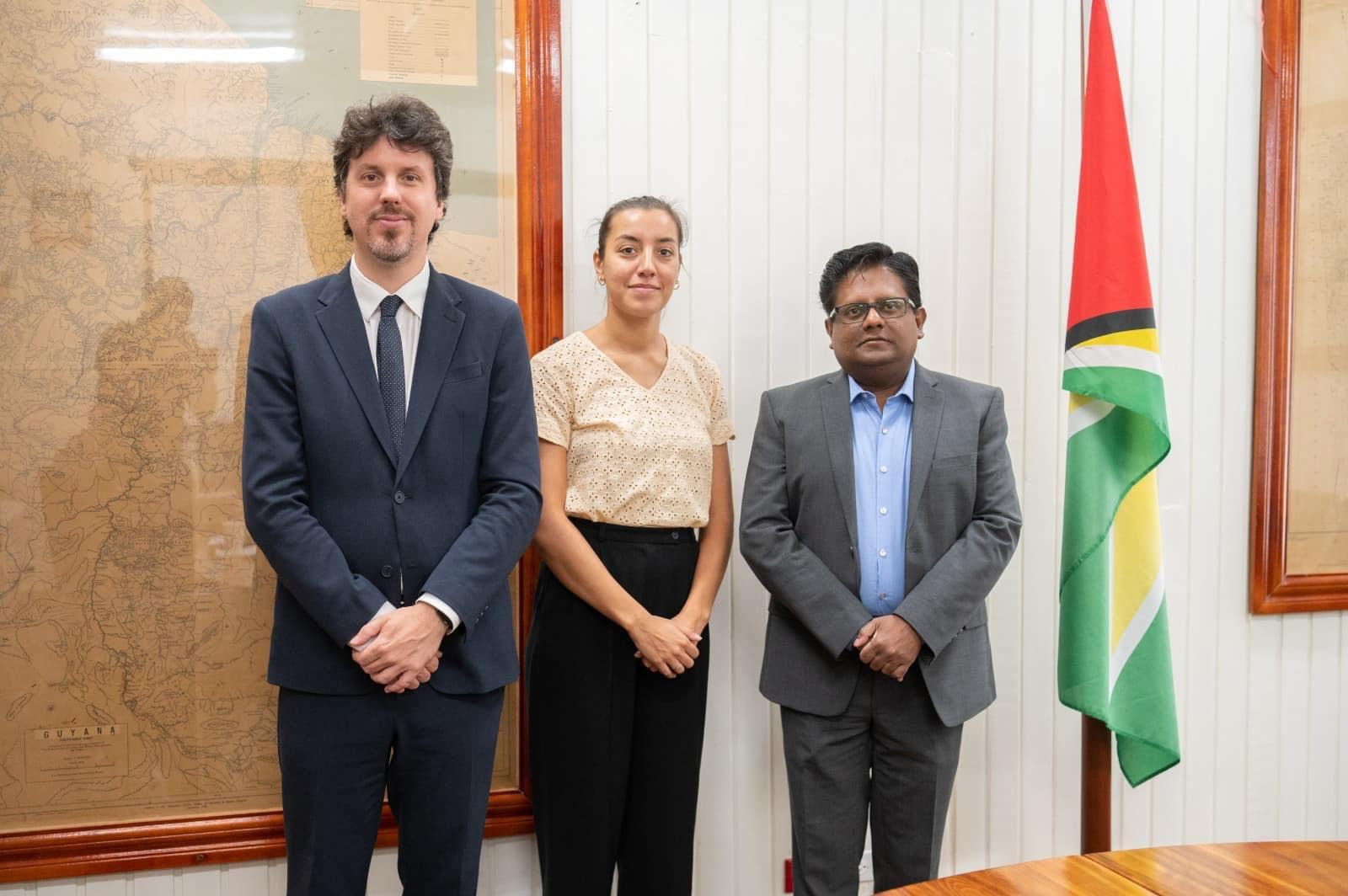 Senior Finance Minister, Dr. Ashni Singh (right) and members of the French group