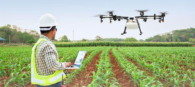 Funding opportunity - Farm of the Future: Image of farmer with drone in field courtesy of Adobe Stock.