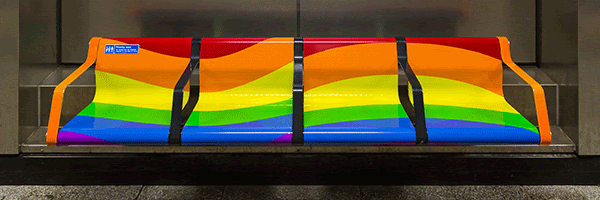 Pride colours on station platform bench