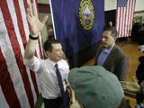 Democratic presidential candidate former South Bend, Ind., Mayor Pete Buttigieg, left, waves at the conclusion of a campaign rally, Sunday, Feb. 9, 2020, in Dover, N.H. (AP Photo/Steven Senne)