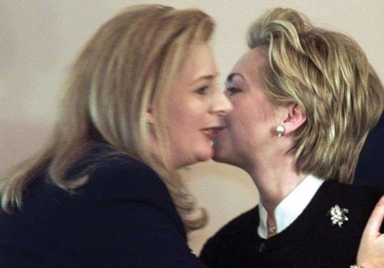 Hillary Clinton kissing Suha Arafat