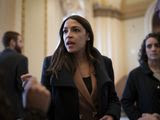 Rep. Alexandria Ocasio-Cortez, D-N.Y., meets with people outside the House chamber on Capitol Hill in Washington, Tuesday, March 3, 2020. (AP Photo/J. Scott Applewhite)