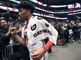 Washington Wizards forward Rui Hachimura (8), of Japan, greets fans after an NBA basketball game against the Chicago Bulls, Tuesday, Feb. 11, 2020, in Washington. The Wizards won 126-114. (AP Photo/Nick Wass)
