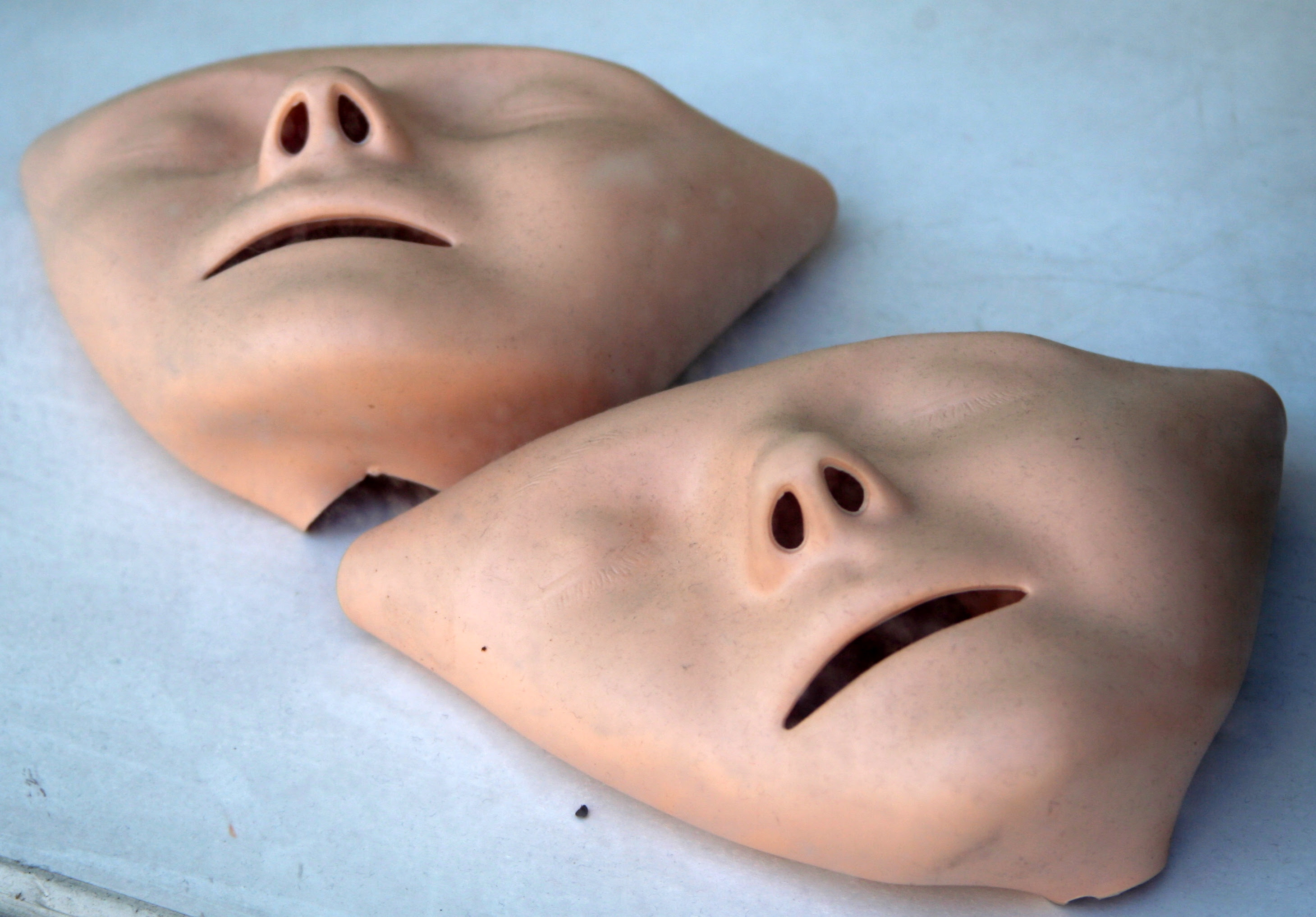 http://upload.wikimedia.org/wikipedia/commons/8/80/First_aid_masks_for_CPR_training.jpg